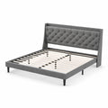 Gray fabric double bed with upholstered headboard